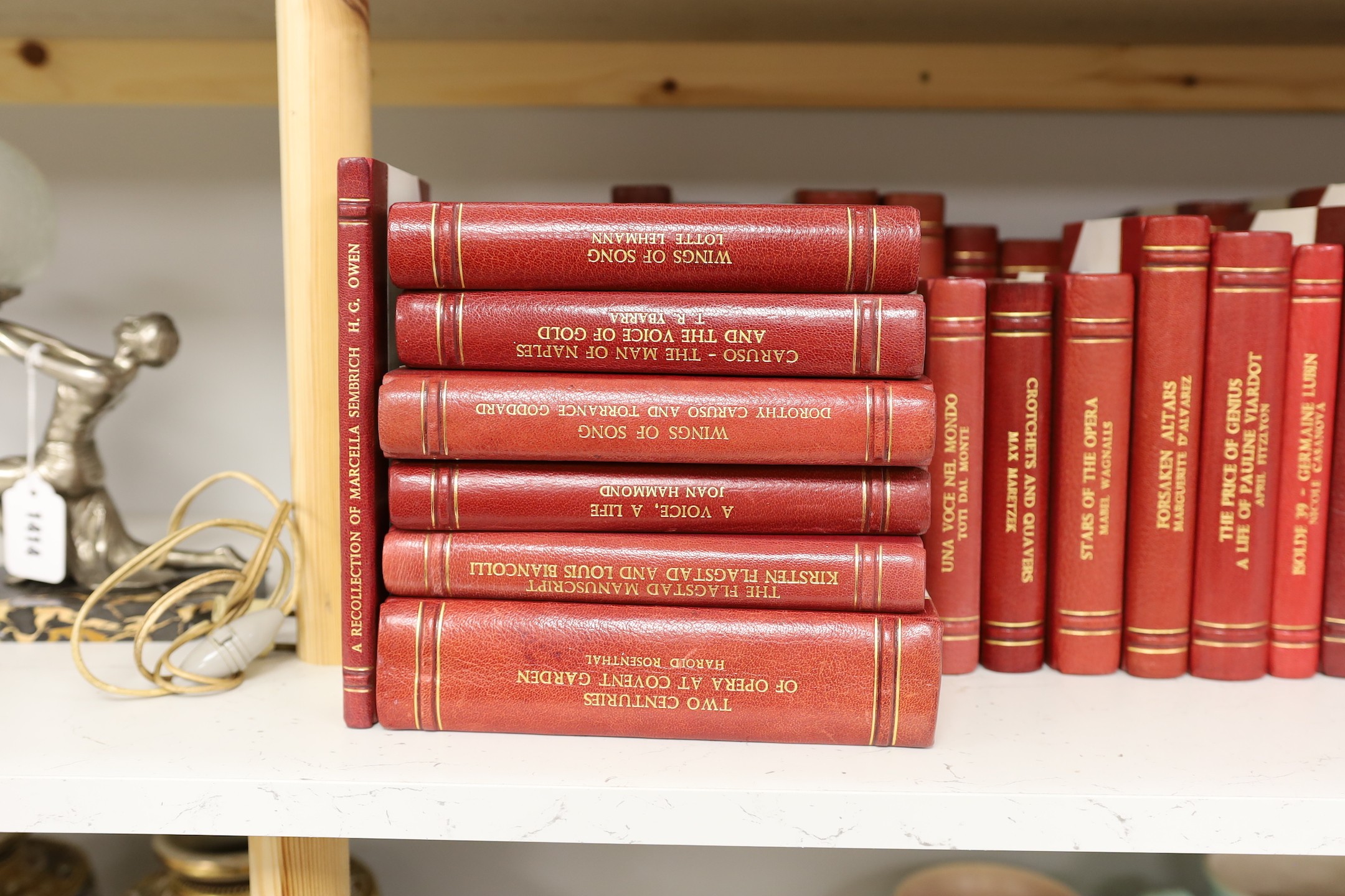 A collection of 19th and 20th century works on opera related biographies, autobiographies and histories, bound in red morocco by EA Weeks, London, approx 66 altogether